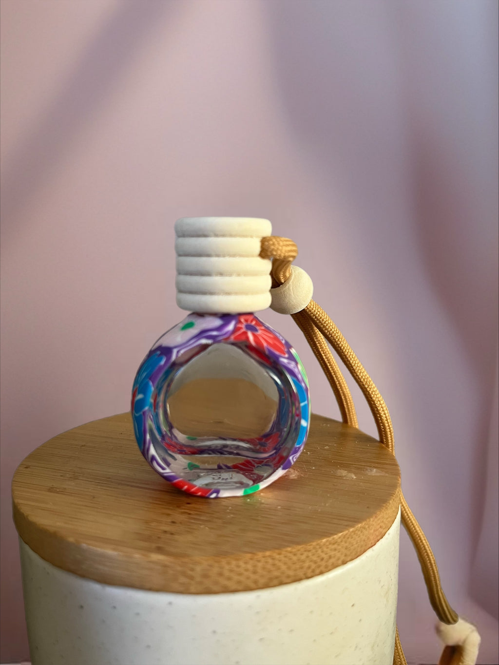 Diffuseur mauve avec fleurs