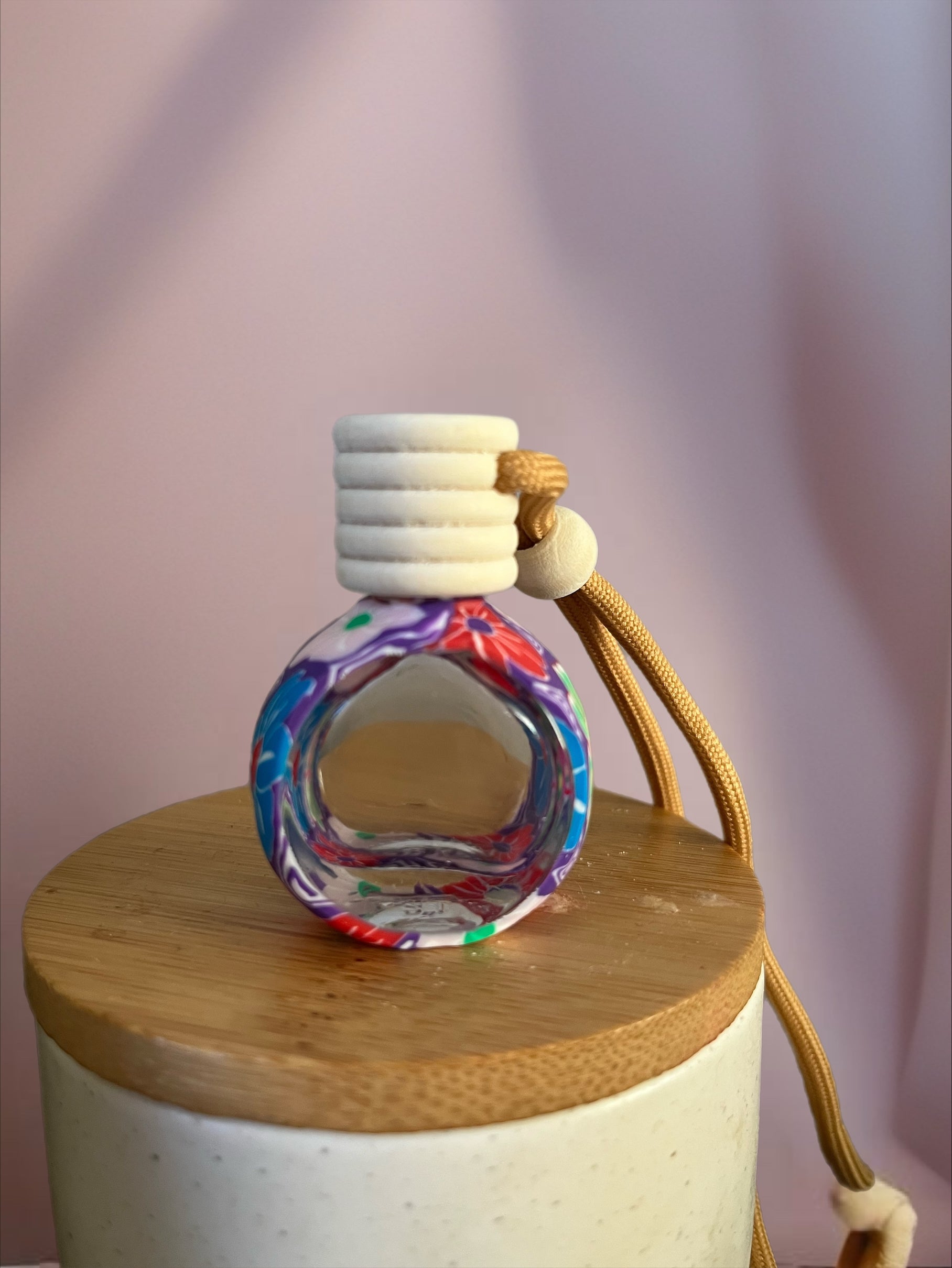 Diffuseur mauve avec fleurs