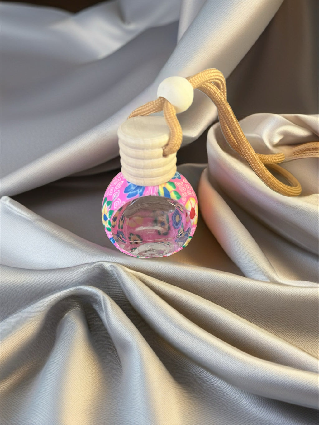 Diffuseur rose avec fleurs