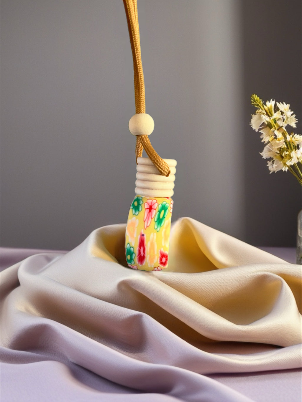 Diffuseur jaune avec fleurs